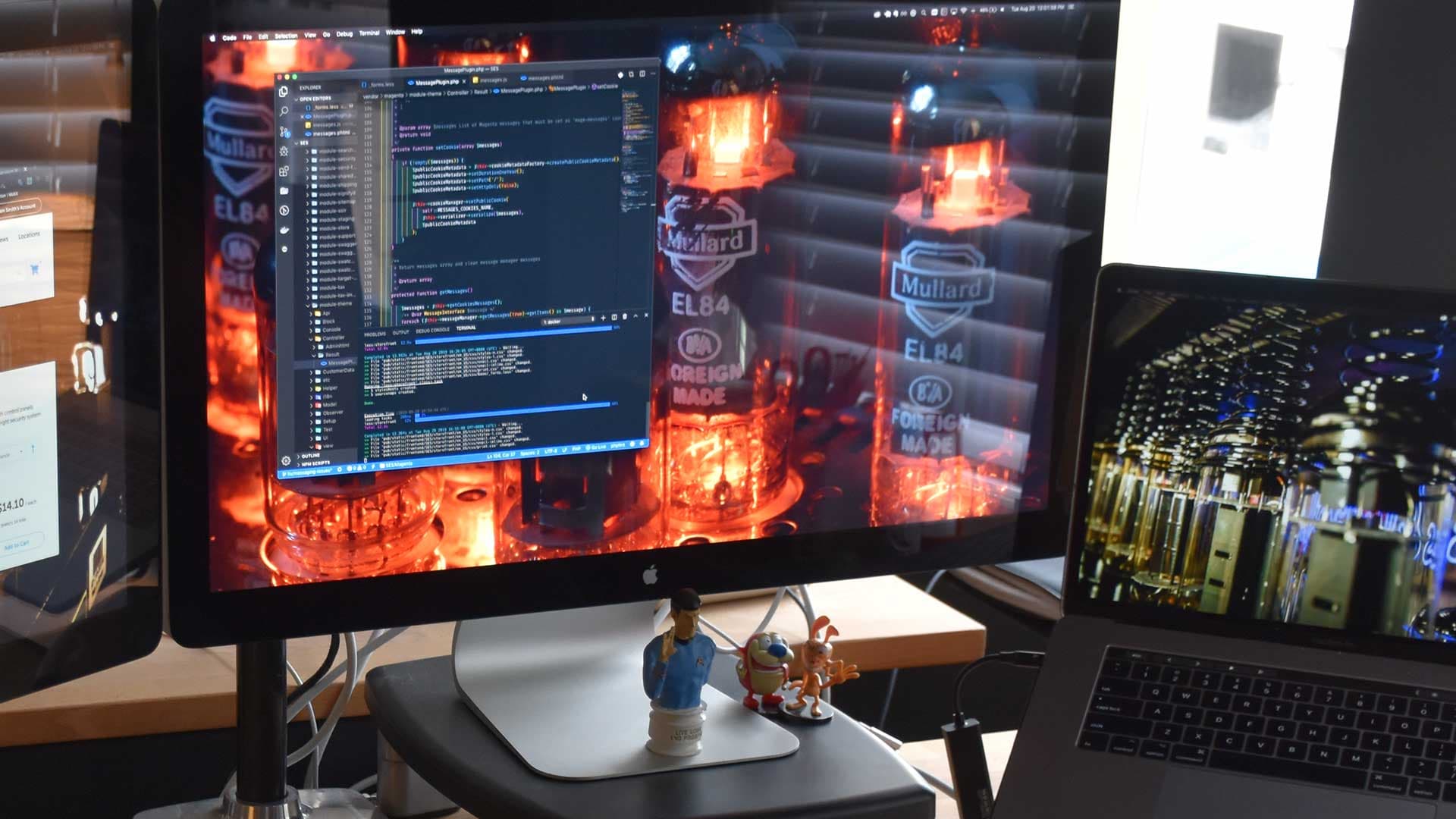 Web development and software development featured image with monitor showing code in dark mode